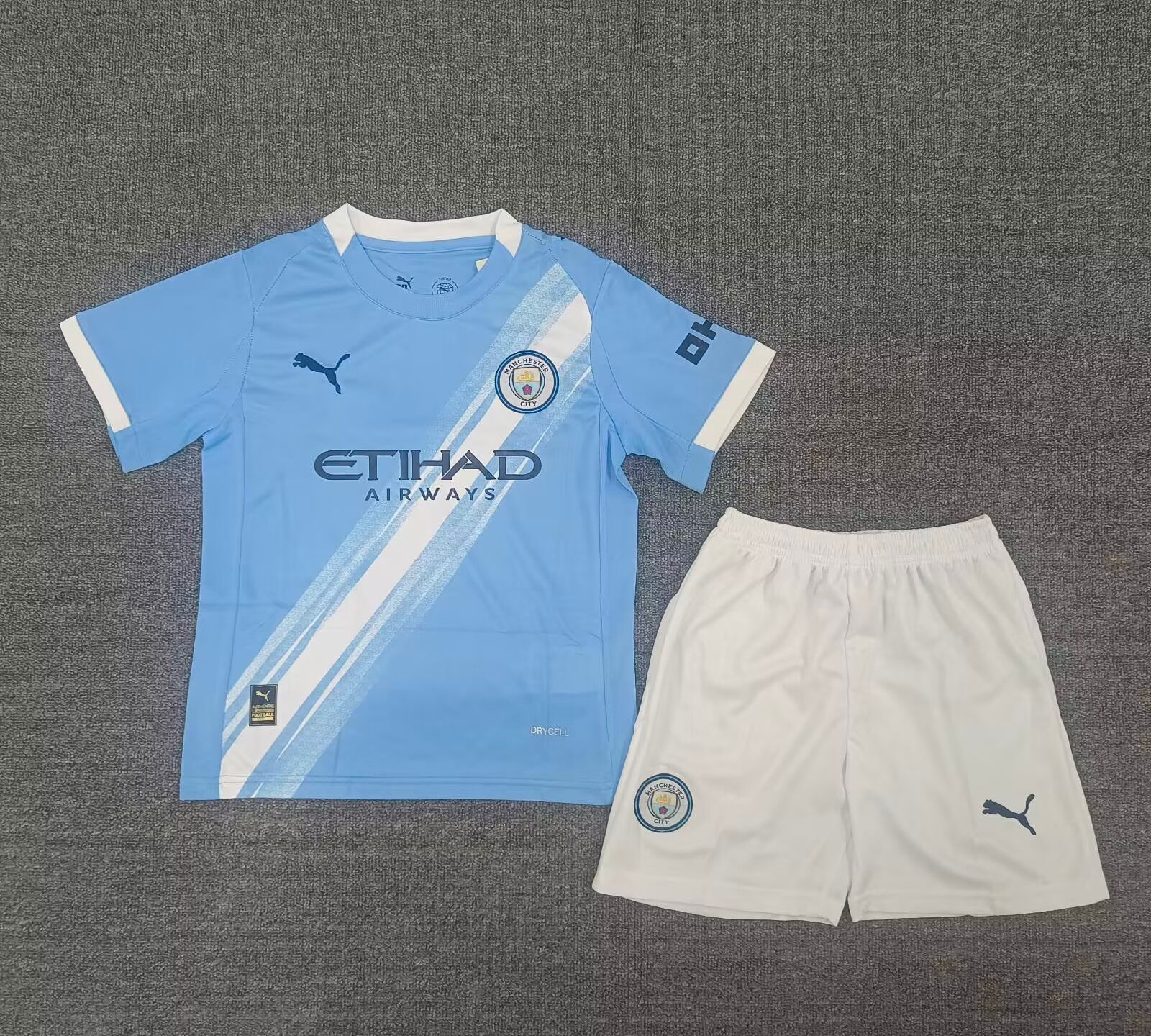0102cfed23a94a57187eaa28af3adf14.jpg 2025/2026 Manchester CityHome Football Shirt Kids Size 1:1 Thai Quality - Image 1