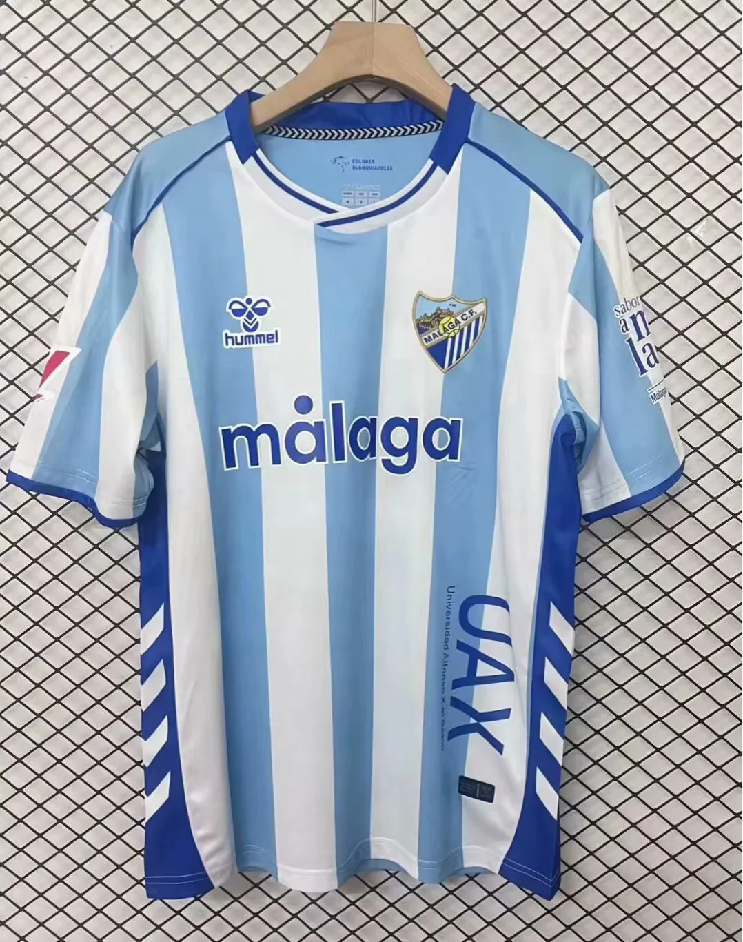 149cfd0ae88447ff4f285ce293e4104b.webp 2025/2026 Malaga Home Football Shirt 1:1 Thai Quality - Image 1