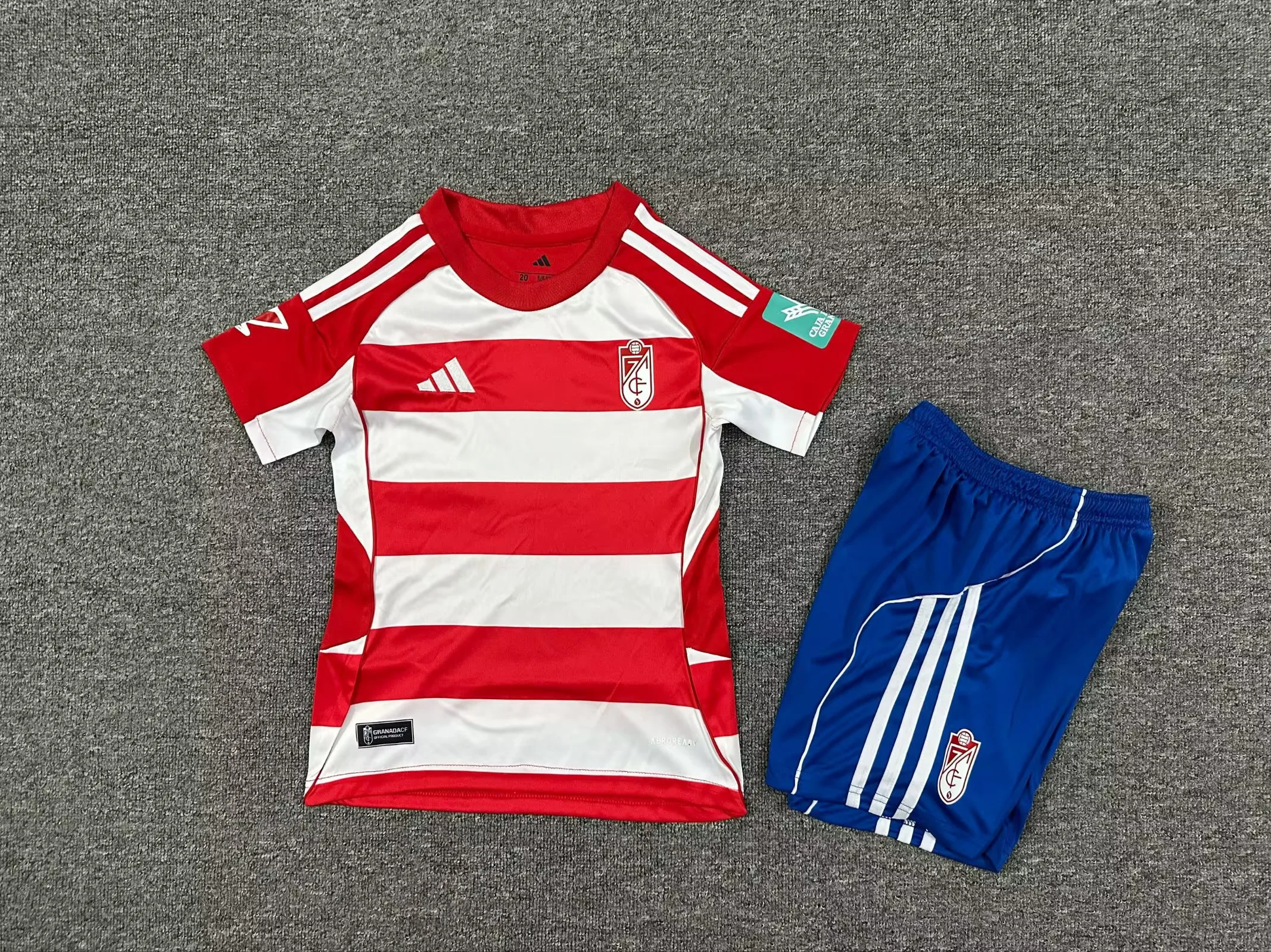 67a9a95f82164b018f4fe874060448d9.webp 2025/2026 Granada Home Football Shirt Kids Size 1:1 Thai Quality - Image 1