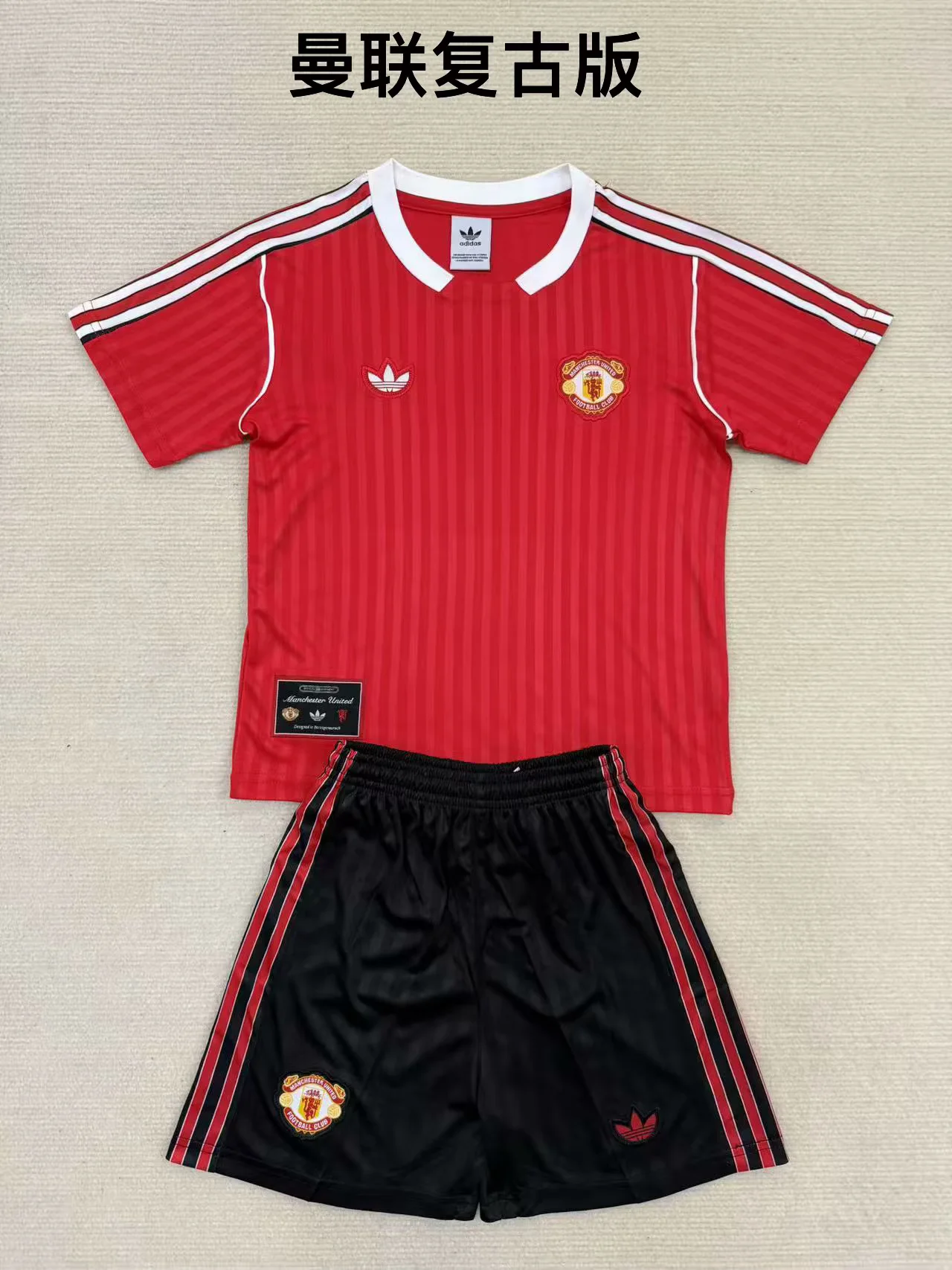 b85fc94e0f381d15d8cae45c04db58f3.webp 2025/2026 Manchester United Special Edition Football Shirt Kids Size 1:1 Thai Quality - Image 1