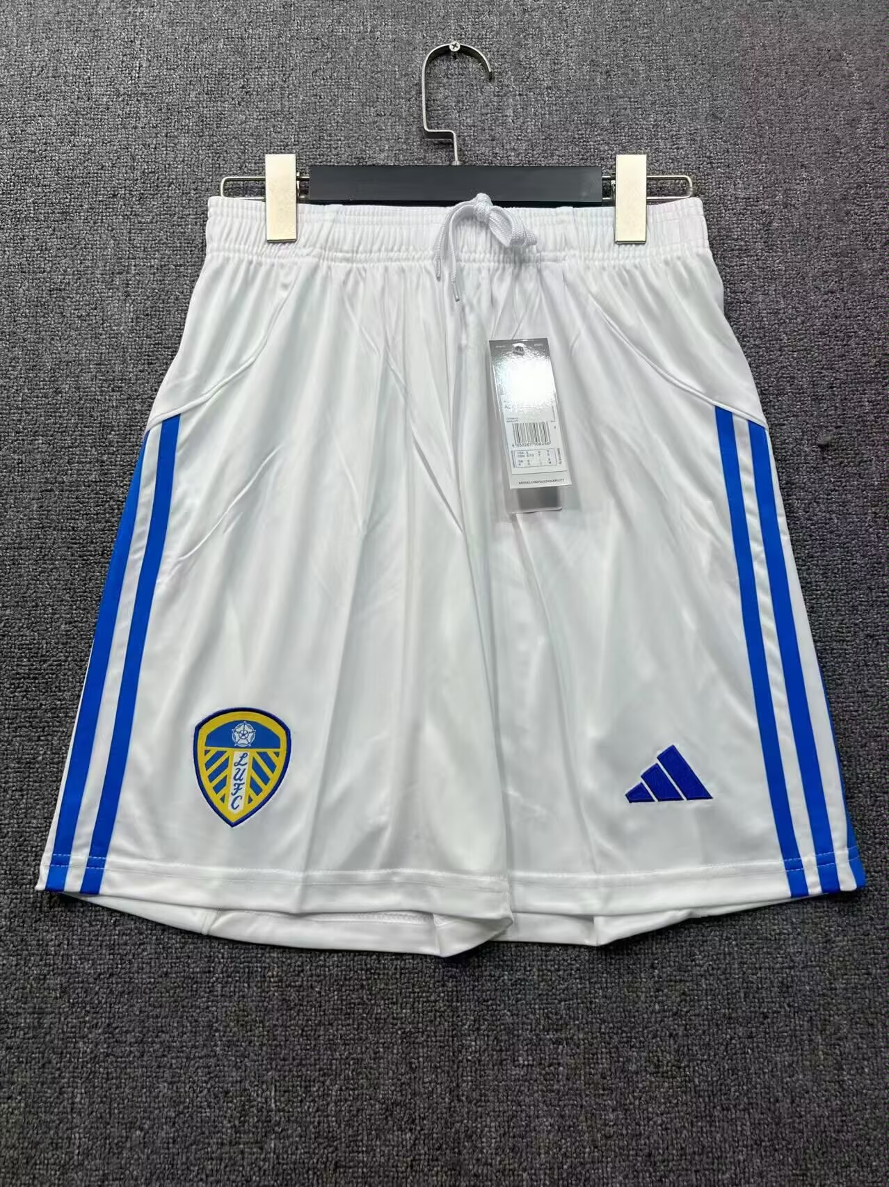 ced00dfcd7ffce43c790829d5f9d83cd.jpg 2025/2026 Leeds United Home Shorts 1:1 Thai Quality - Image 1