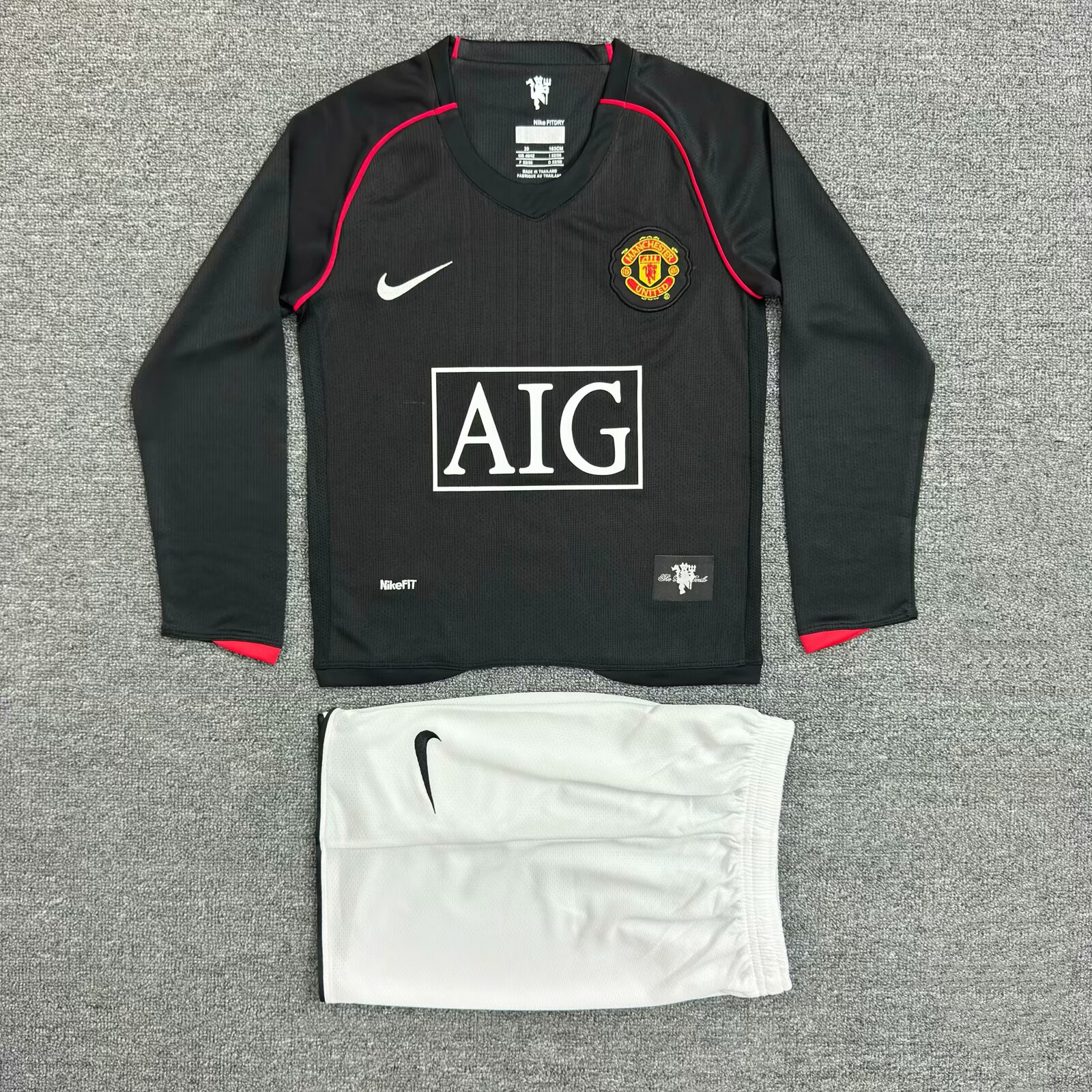 f64097c6108c06997a8fb885a91d8aaa.jpg 2007/2008 Retro Long Sleeve Manchester United Away Football Shirt Kids Size 1:1 Thai Quality - Image 1